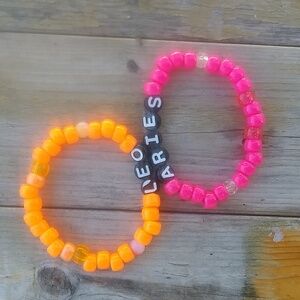 Leo and Aries matching bracelets.